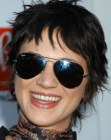 Asia Argento's shag type pixie cut with layers on top of the head