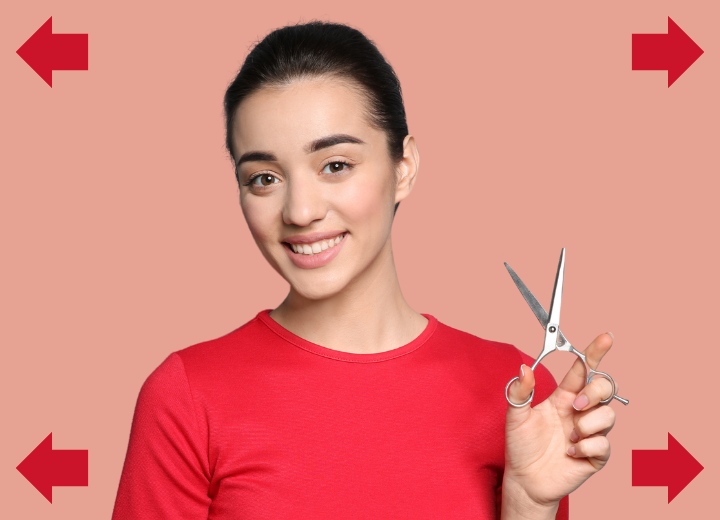 Left-handed hairdresser who is holding scissors
