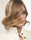 shoulder-length curled hair