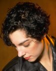 hair cut above the lobes of the ears