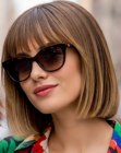 Blunt dark-blonde bob with bangs