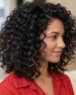 Curly shoulder-length hairstyle