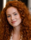 Long red hair with curls