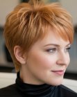 Strawberry blonde pixie cut