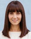 Long and sleek brown hair with bangs