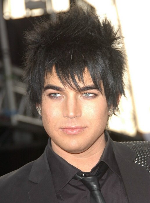 Adam Lambert's spiked hairstyle with a blue coal dark color.