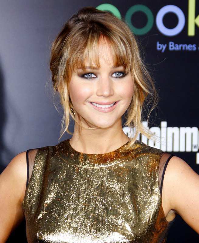Jennifer Lawrence | Up-style with a woven chignon and playful bangs