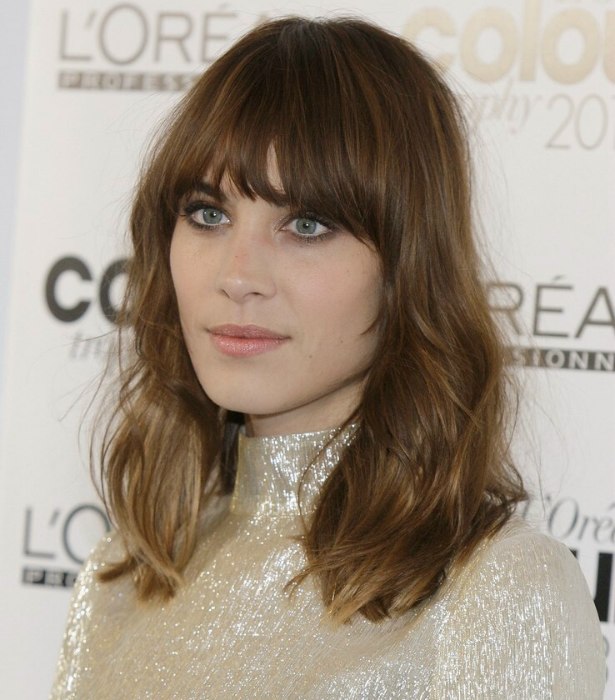Alexa Chung  Long hair with a messy unkempt feel and at 