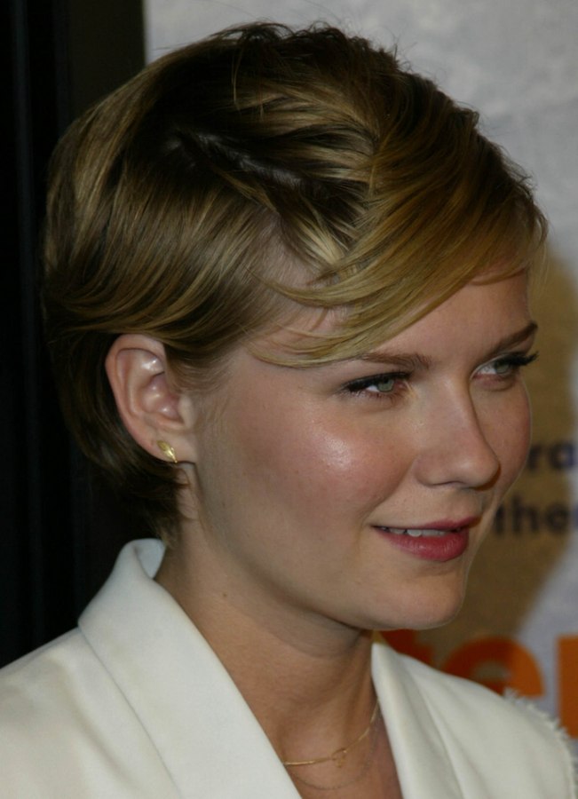 Kirsten Dunst sporting a sophisticated short haircut or pixie