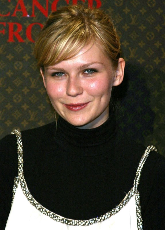Kirsten Dunst sporting a sophisticated short haircut or pixie
