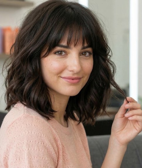 Cheveux ondul&eacute;s mi-longs