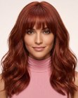 Cheveux longs et ondul&eacute;s roux