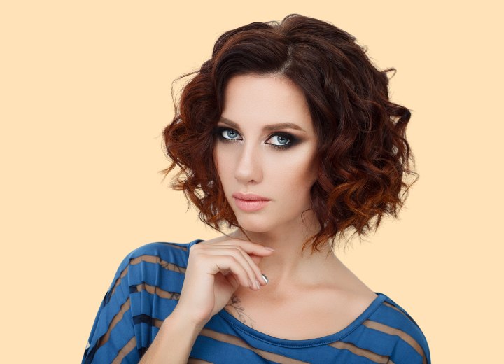 Fullness for curly hair with an a-line cut, stacked bob or wedge cut