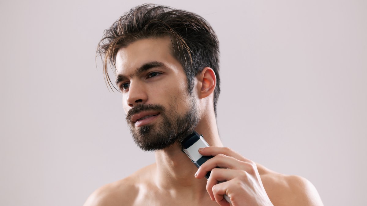 shaving facial hair with razor