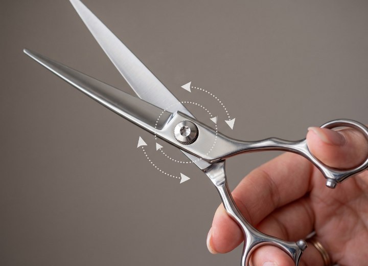 Haircutting scissors pivot point