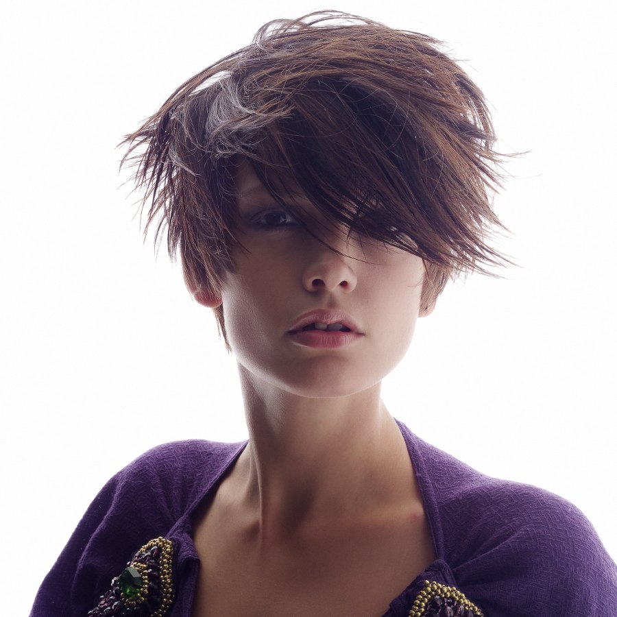 Short windblown hairstyle emphasizing the strong lines of jaw and chin