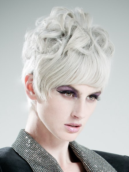 Short hairstyles with unusual comtemporary lines and high volume