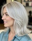 Silver-blonde shoulder-length hair