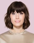 Long bob with a bold fringe