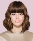 Modern long bob with full bangs