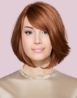 Sleek auburn bob with soft layers