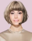 Ash blonde bob with a blunt fringe